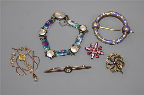 An early 20th century silver, enamel and mother of pearl bracelet, a Victorian yellow metal and two colour enamel target brooch etc.